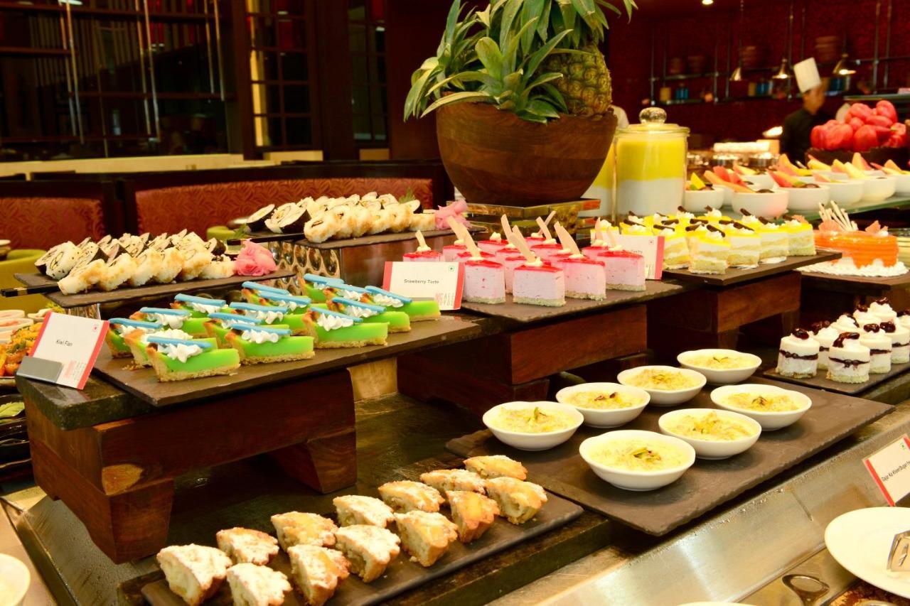 Radisson Blu Hotel Guwahati Exterior photo A dessert buffet