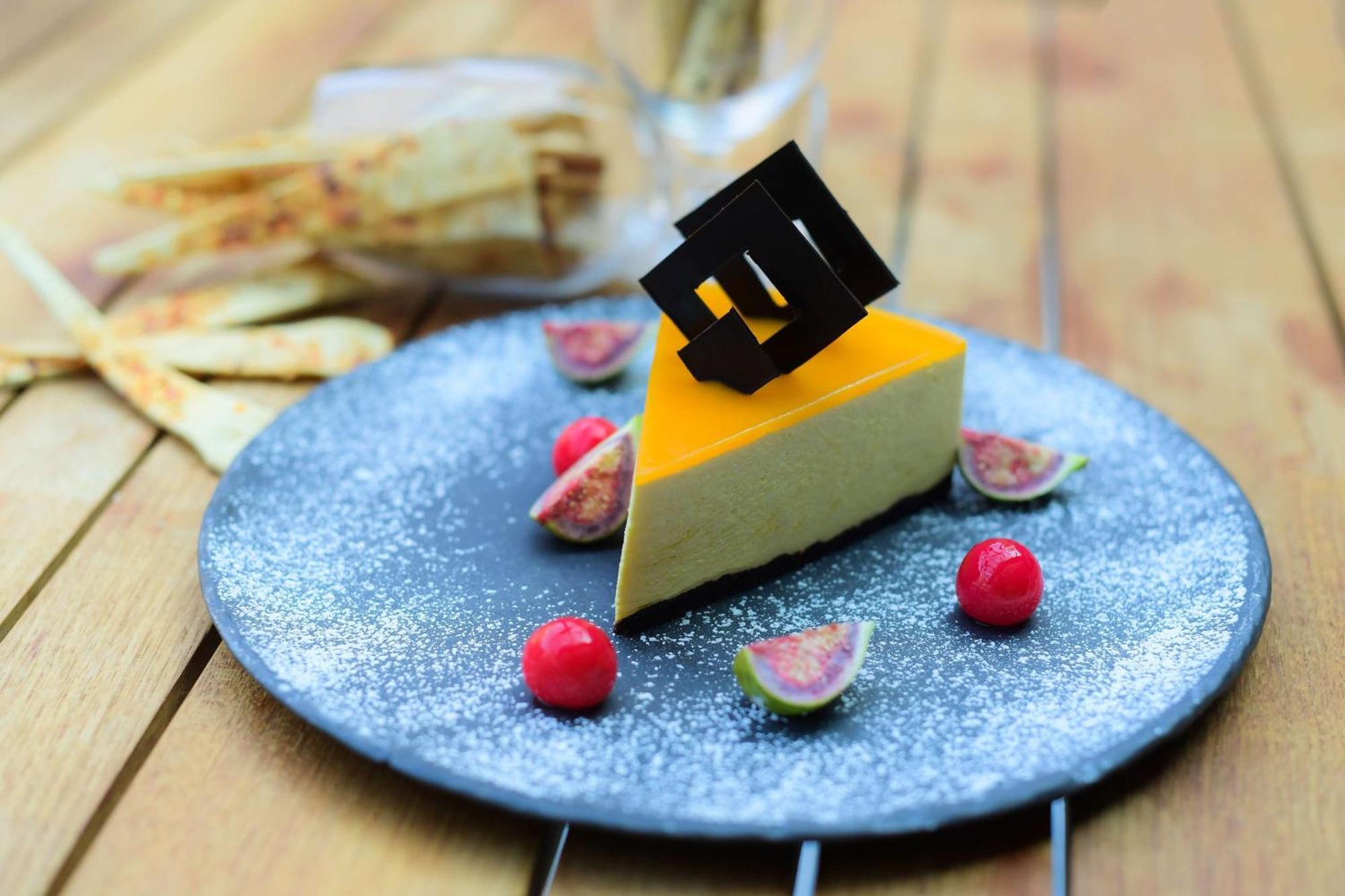 Radisson Blu Hotel Guwahati Exterior photo A slice of mango cheesecake
